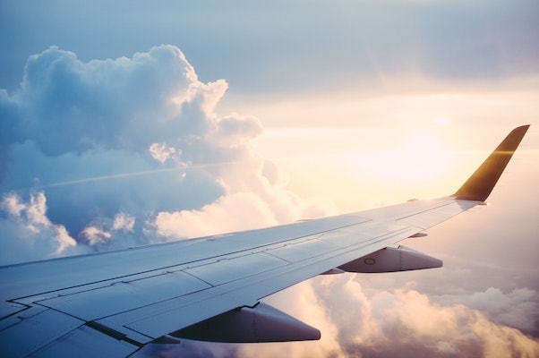 view out the window of a plane in the air